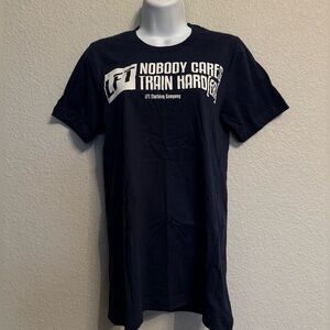 NWOT LFT “Nobody Cares Train Hard(Er) blue tee